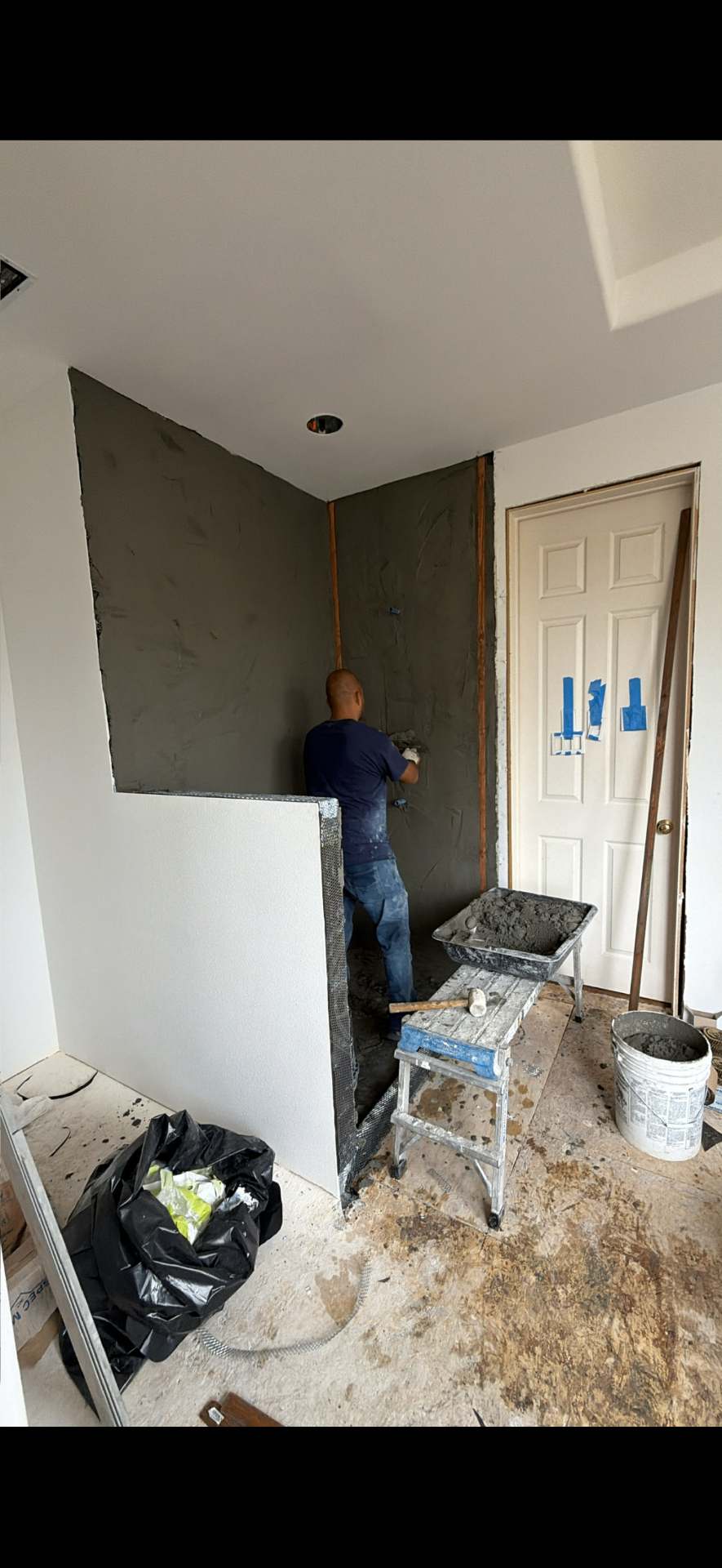 Shower waterproofing and mortar prep in progress